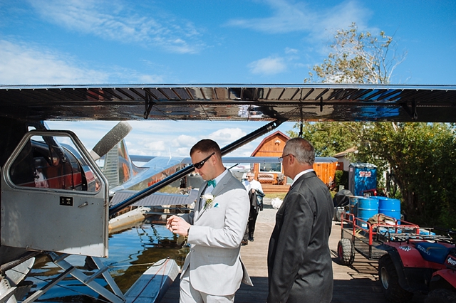 float plane carries groom for beluga lake wedding photography