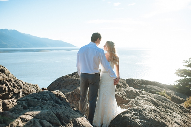 Anchorage bridal portraits with bride and groom on rocks