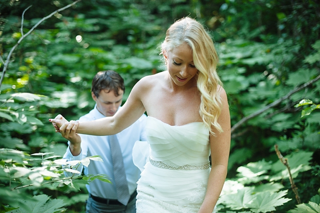 bride and groom with greenery Anchorage Wedding Portraits