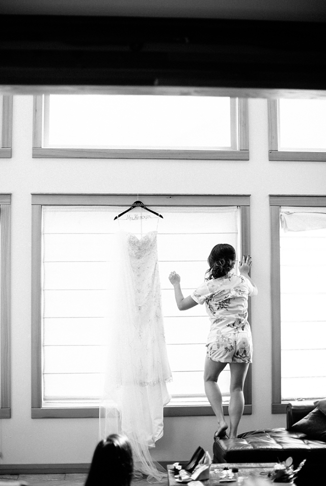 girdwood wedding photos with bride getting dress