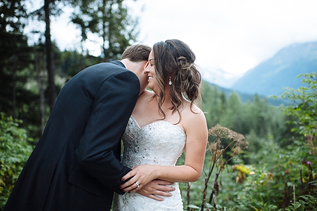 bride and groom snuggle at Crow Creek Mine Wedding in Alaska