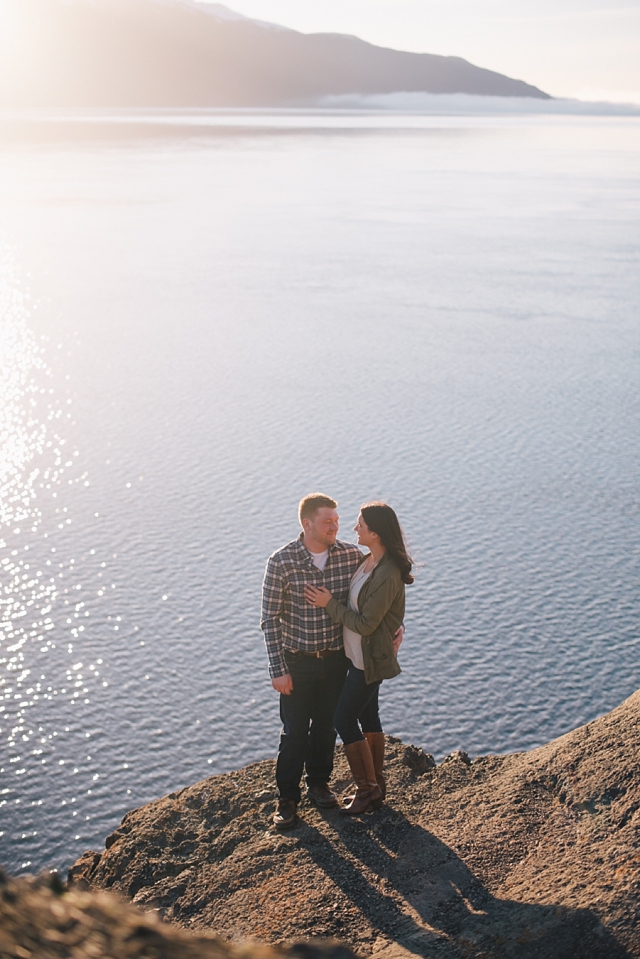 Anchorage Engagement Photography on rocks with sunset