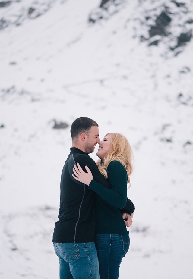 Hatcher Pass Winter Engagement Photos of hiking in the snow