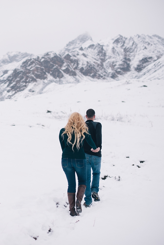 Hatcher Pass Winter Engagement Photos of hiking in the snow