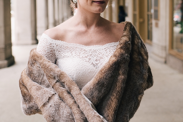 university club of chicago wedding bride wearing lace and fur