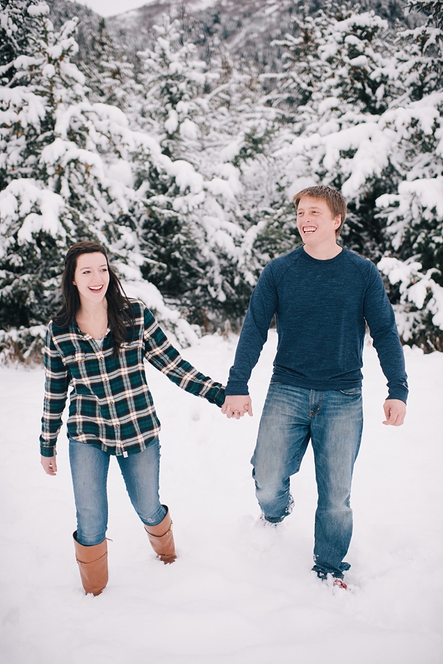 alaska winter engagement photos with snowy trees