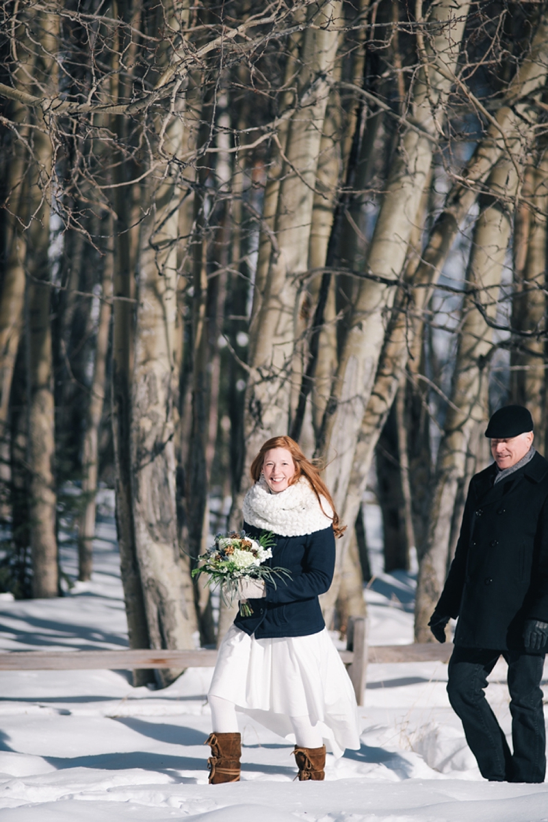 Outdoor Anchorage Winter Elopement bride walking down the aisle