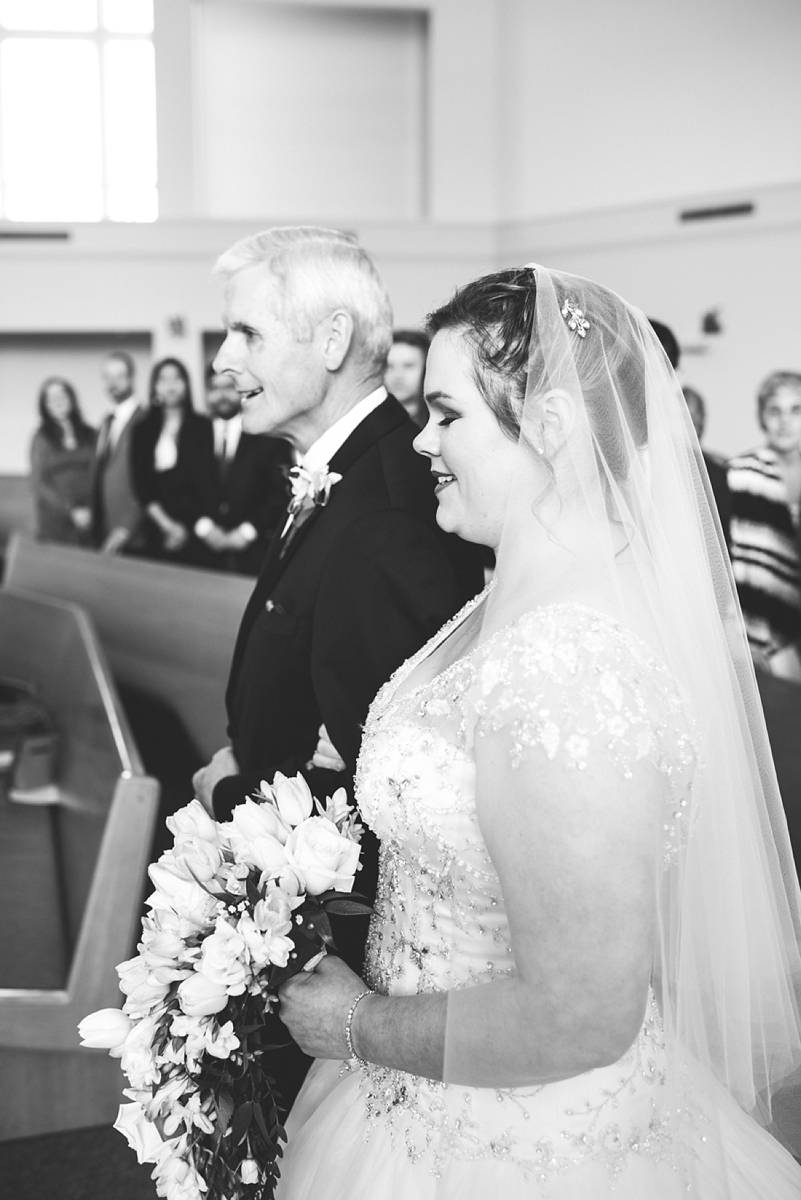 father walks bride down the aisle anchorage wedding